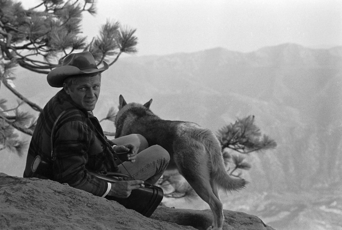 Steve McQueen with his dog, a Malamute named Mike in California, 1963 photo by Jonh Dominis